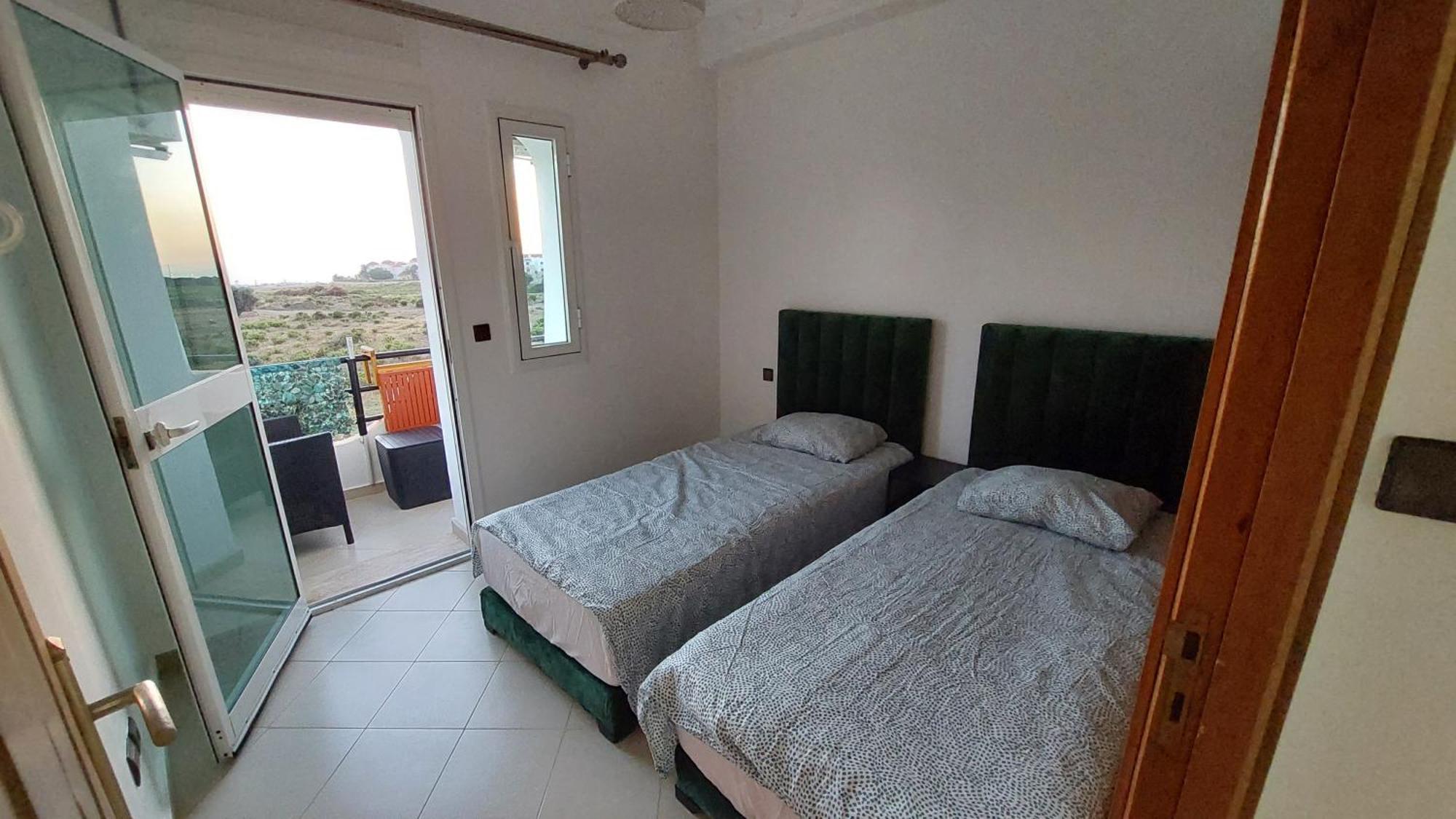 Appartement Avec Piscines, Vue Sur Mer Et Acces A La Plage A Achakar Hill, Tanger. Esterno foto
